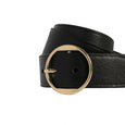 Black belt with a gold buckle on a white background