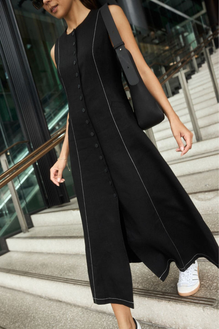 The perfect dress to feel put together immediately, the Guide Black Maxi Vest Dress, available from www.thecollectivenz.com