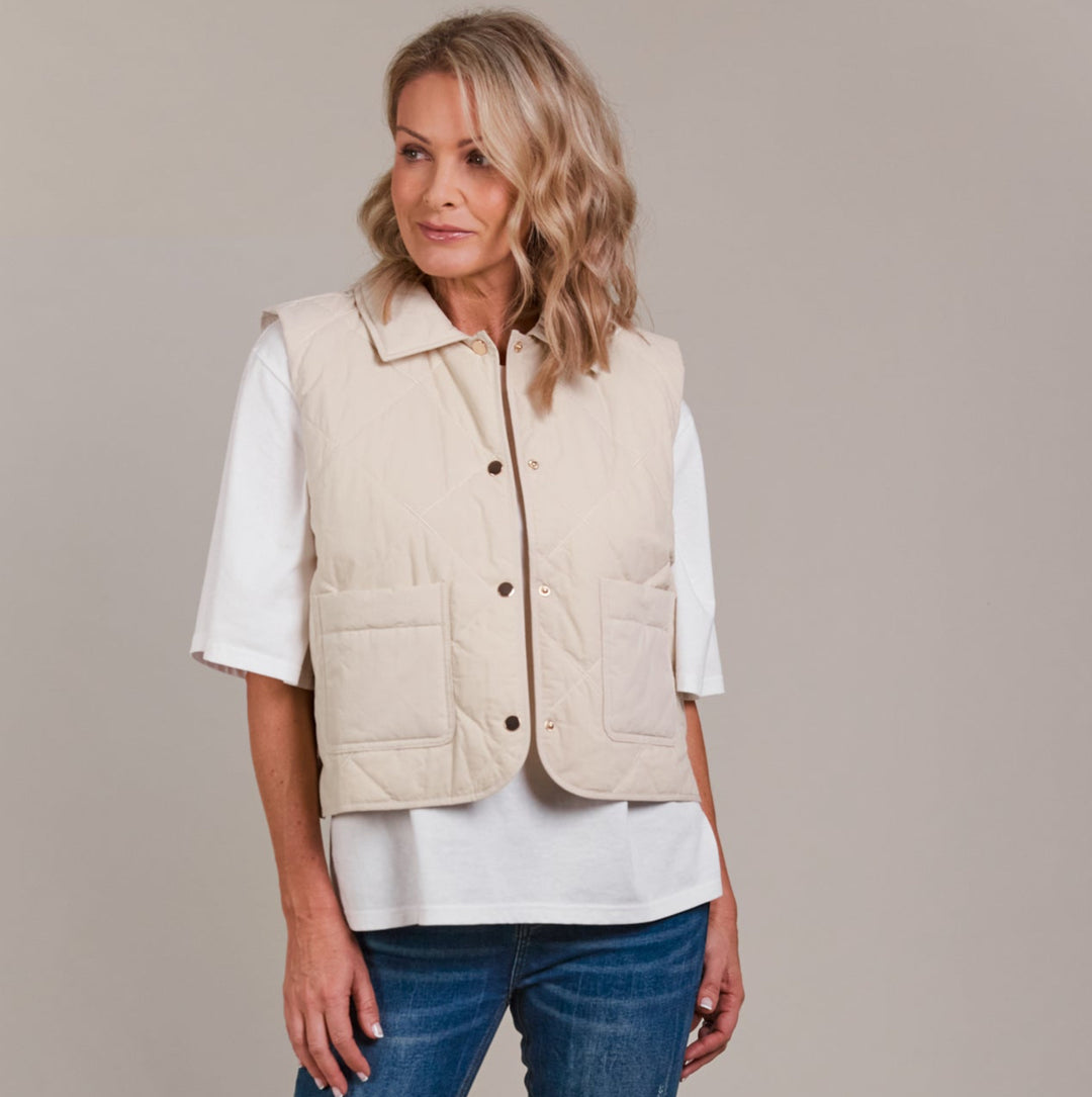 Designed with purpose, the Pepi Vest is crafted from 100% cotton and features a practical zip and press stud closure, convenient patch pockets, and an adjustable drawstring for the perfect fit. Available from www.thecollectivenz.com