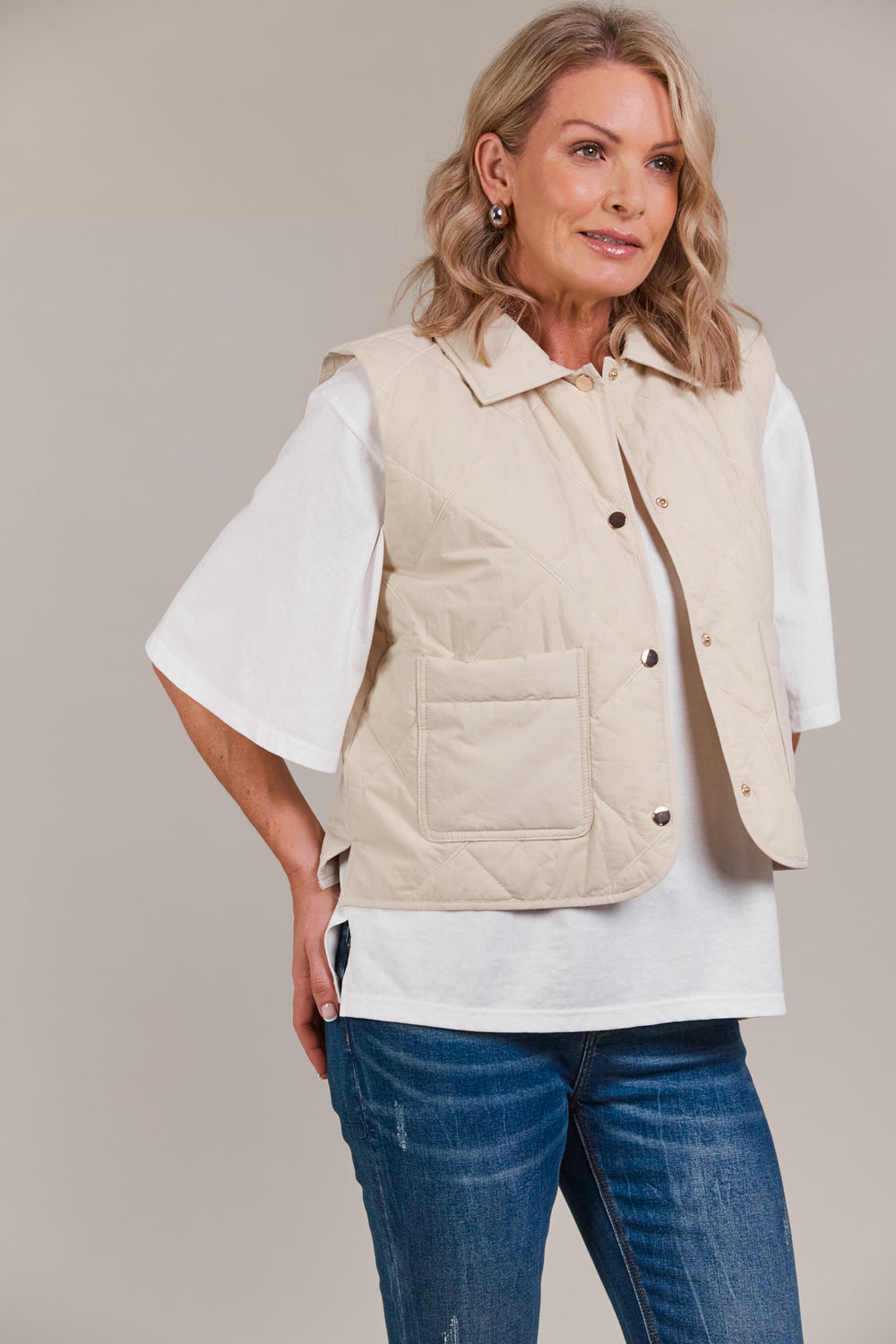 Designed with purpose, the Pepi Vest is crafted from 100% cotton and features a practical zip and press stud closure, convenient patch pockets, and an adjustable drawstring for the perfect fit. Available from www.thecollectivenz.com