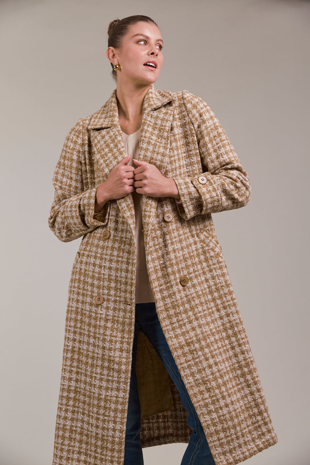 Discover refined winter styling with the Aman Coat, your ultimate companion for a polished, sophisticated look. Available from www.thecollectivenz.com