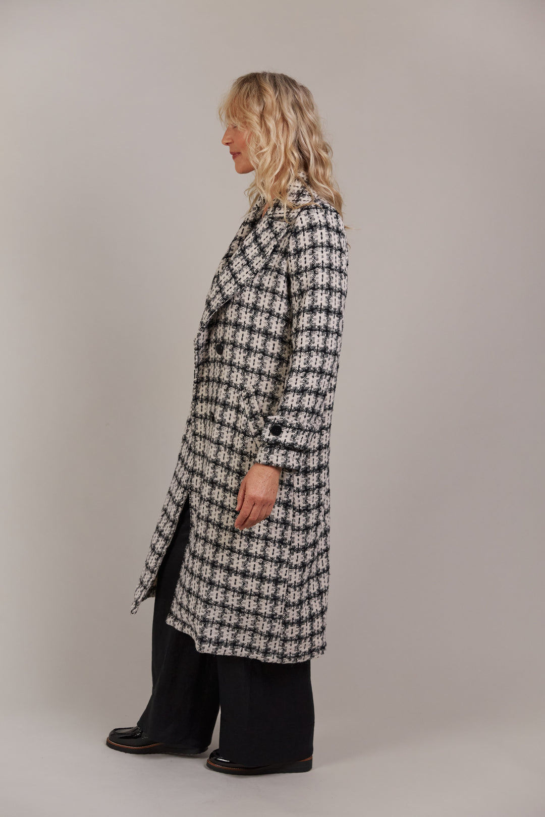 Discover refined winter styling with the Aman Coat, your ultimate companion for a polished, sophisticated look. Available from www.thecollectivenz.com