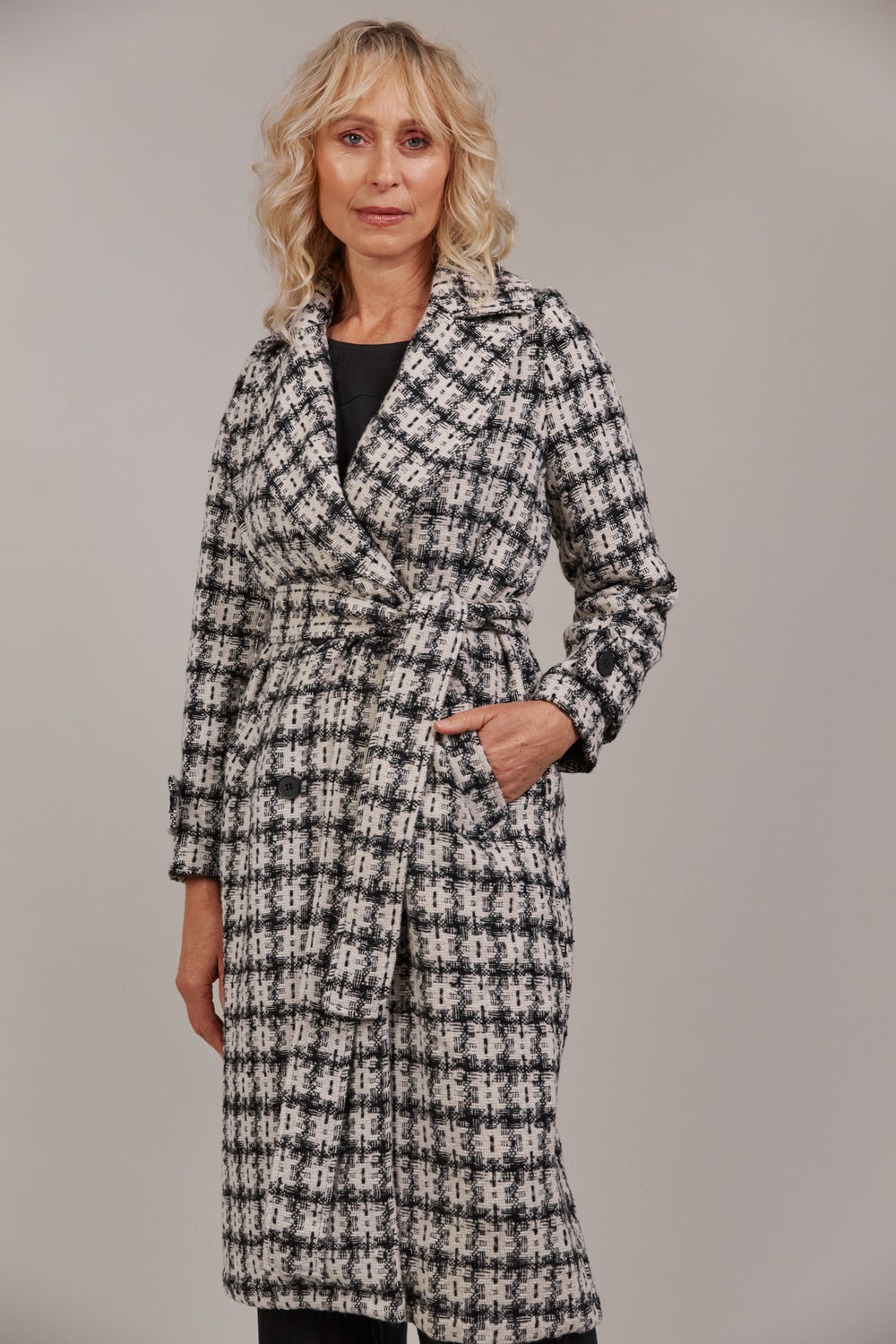 Discover refined winter styling with the Aman Coat, your ultimate companion for a polished, sophisticated look. Available from www.thecollectivenz.com