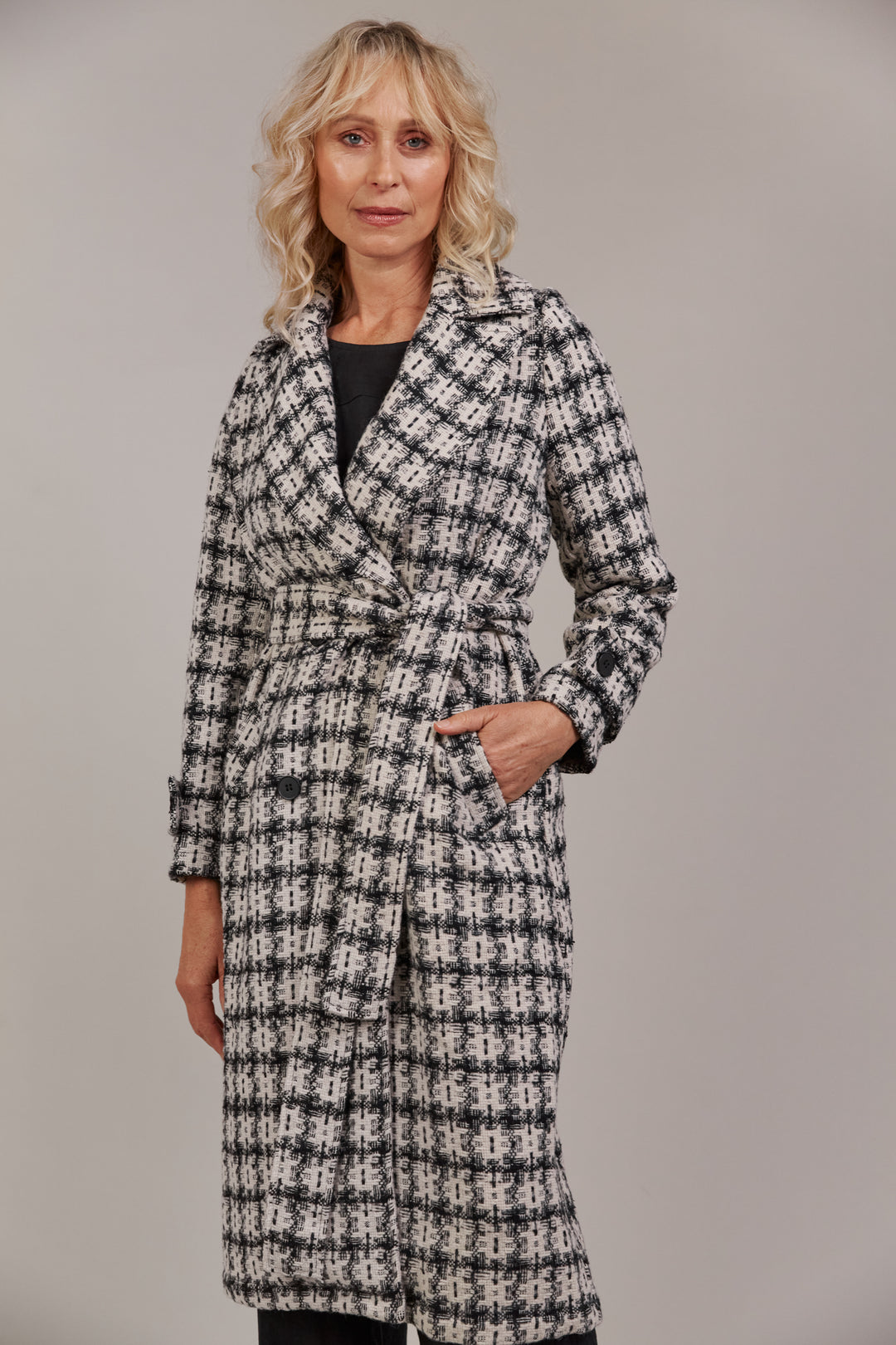 Discover refined winter styling with the Aman Coat, your ultimate companion for a polished, sophisticated look. Available from www.thecollectivenz.com