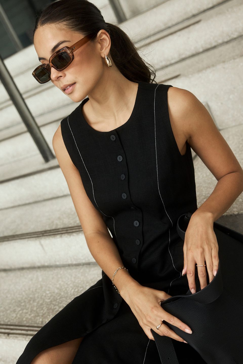 The perfect dress to feel put together immediately, the Guide Black Maxi Vest Dress, available from www.thecollectivenz.com