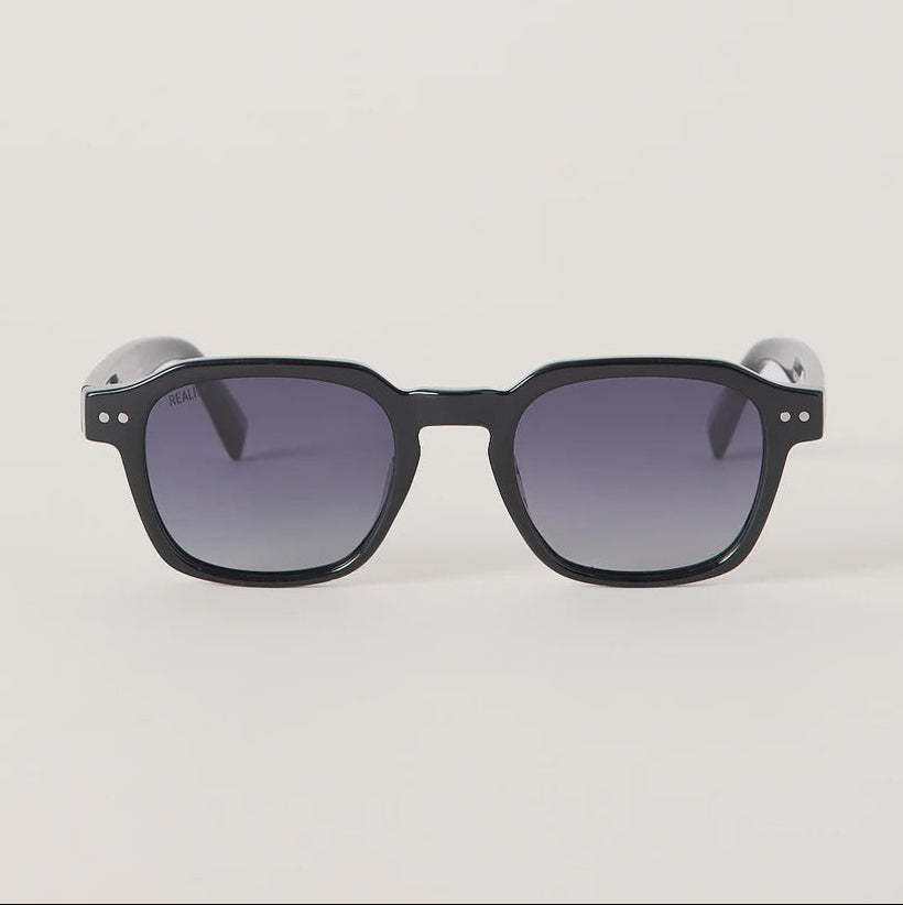 Black square sunglasses with gradient gray lenses, shown from the front on a light gray background.