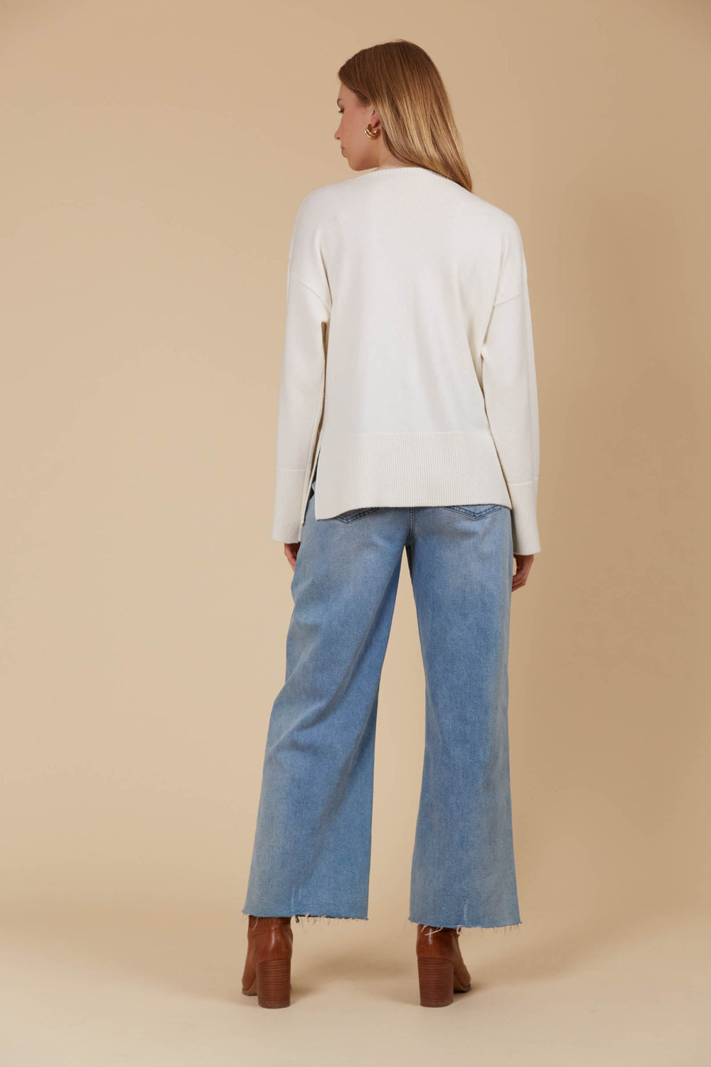 Made from a premium wool blend, the Selene Jumper embraces the softer side of the season, offering both warmth and comfort. Available from www.thecollectivenz.com