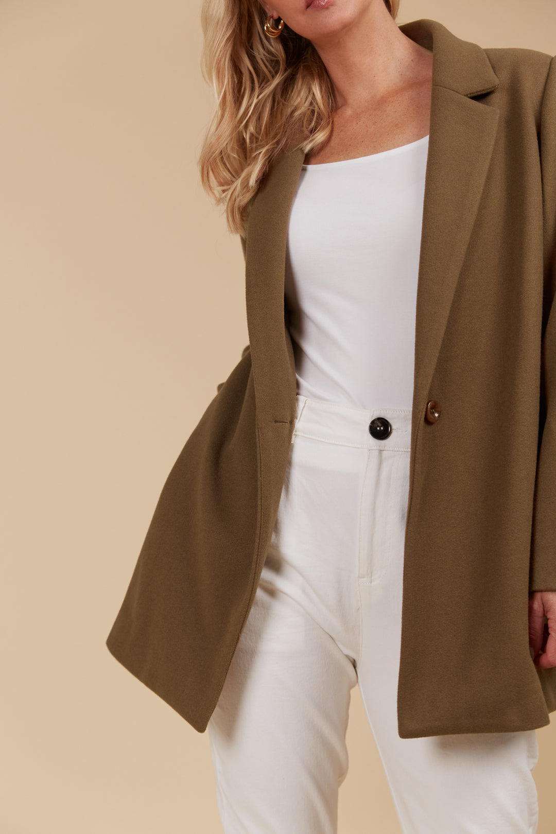 Blending the sleek style of a blazer with the insulating warmth of a coat, the Kali Coat is designed for chilly climates without compromising sophistication, available from www.thecollectivenz.com