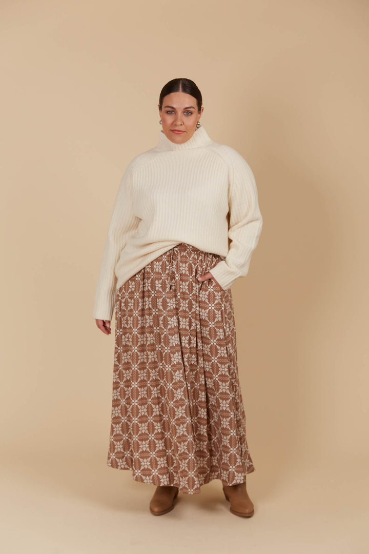 The Venus Skirt seamlessly transitions from your 9-5 to 5-9 plans. Its flowing A-line silhouette adds a soft, feminine feel, enhanced by the comfortable elastic waist and adjustable drawstring. Available from www.thecollectivenz.com