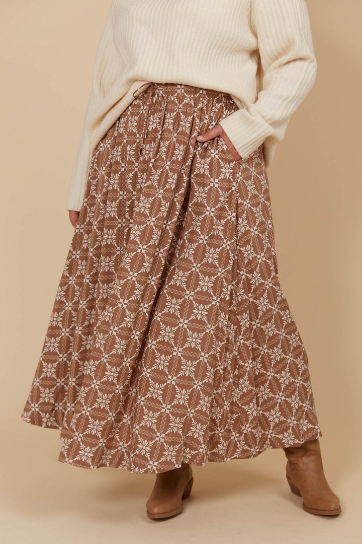 The Venus Skirt seamlessly transitions from your 9-5 to 5-9 plans. Its flowing A-line silhouette adds a soft, feminine feel, enhanced by the comfortable elastic waist and adjustable drawstring. Available from www.thecollectivenz.com