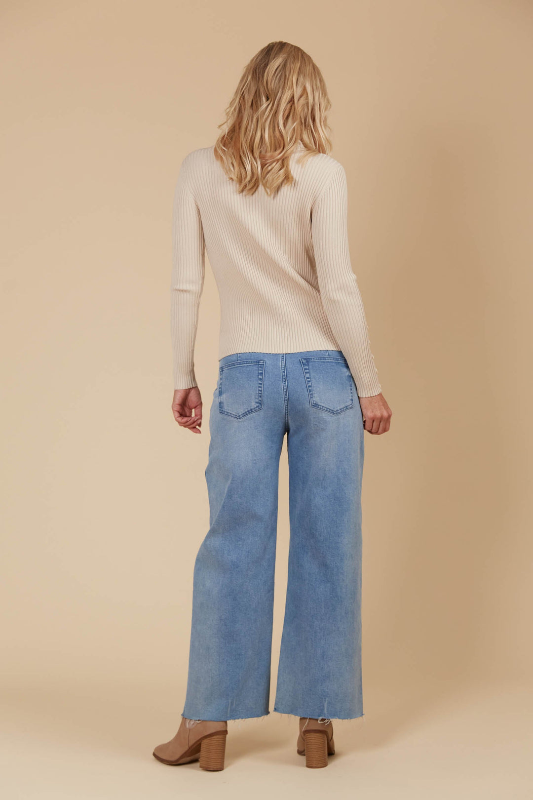 Destined to be the hardest working piece in your closet, the Juno Knit Top is set to be your go-to staple this season.  Available from www.thecollectivenz.com