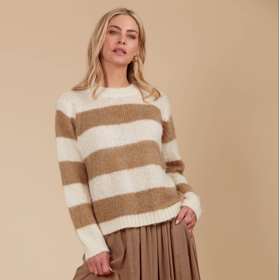Say hello to your ultimate cosy winter staple! The Pallas Stripe Jumper wraps you in the warmth of an ultra-soft knit, making it the perfect addition to your seasonal wardrobe. Available from www.thecollectivenz.com
