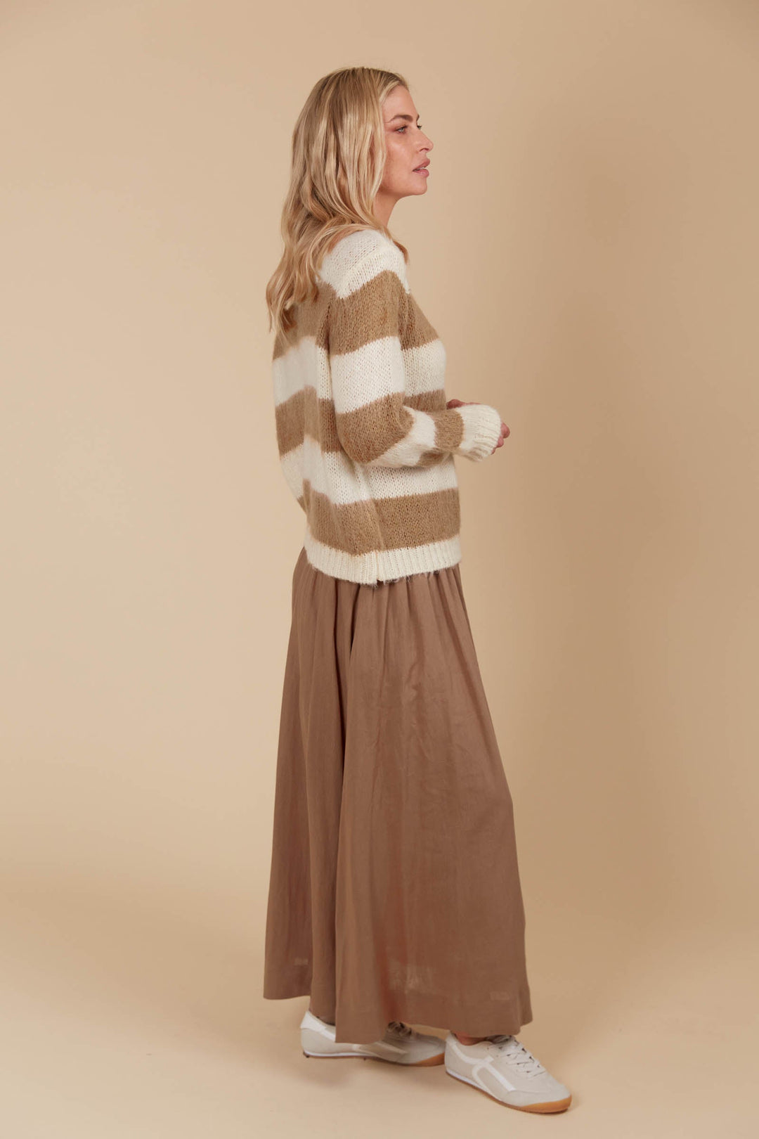 Say hello to your ultimate cosy winter staple! The Pallas Stripe Jumper wraps you in the warmth of an ultra-soft knit, making it the perfect addition to your seasonal wardrobe. Available from www.thecollectivenz.com