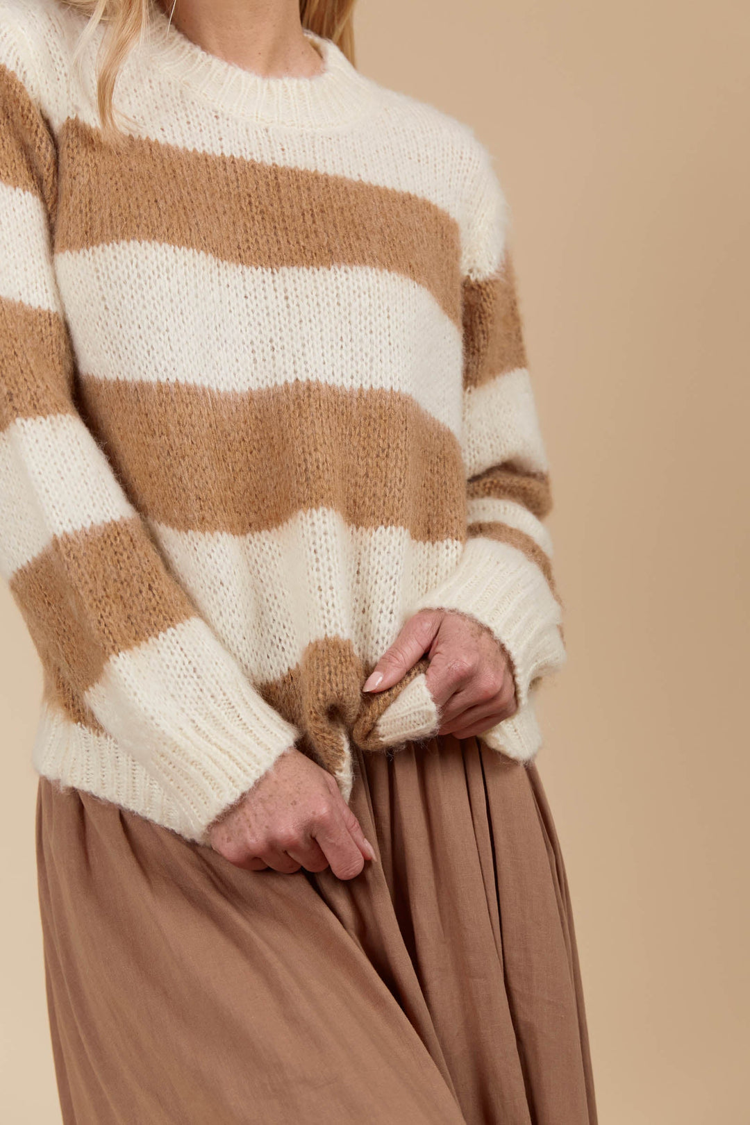 Say hello to your ultimate cosy winter staple! The Pallas Stripe Jumper wraps you in the warmth of an ultra-soft knit, making it the perfect addition to your seasonal wardrobe. Available from www.thecollectivenz.com