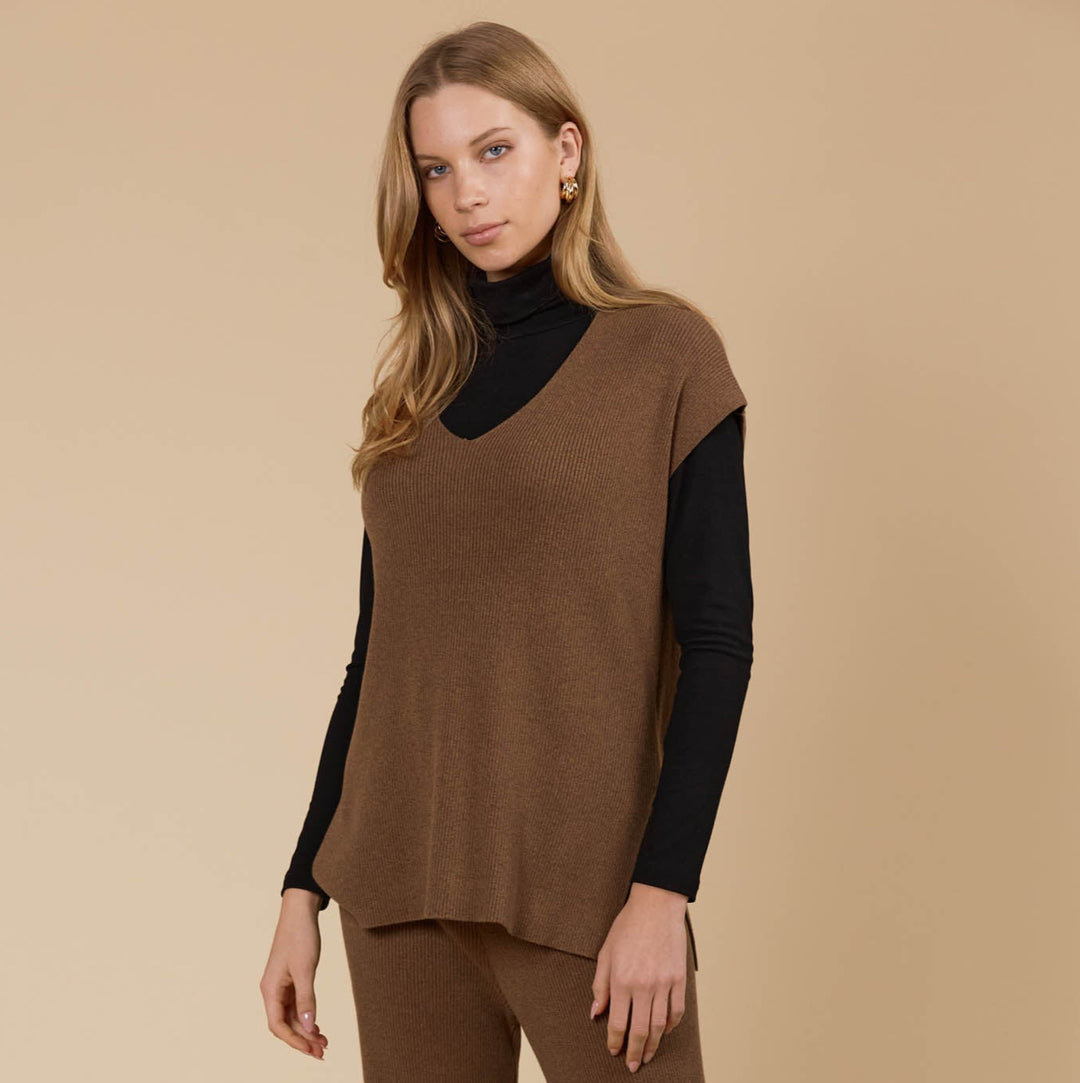 The Tala Knit Vest is designed to seamlessly take you from autumn through winter. Available from www.thecollectivenz.com