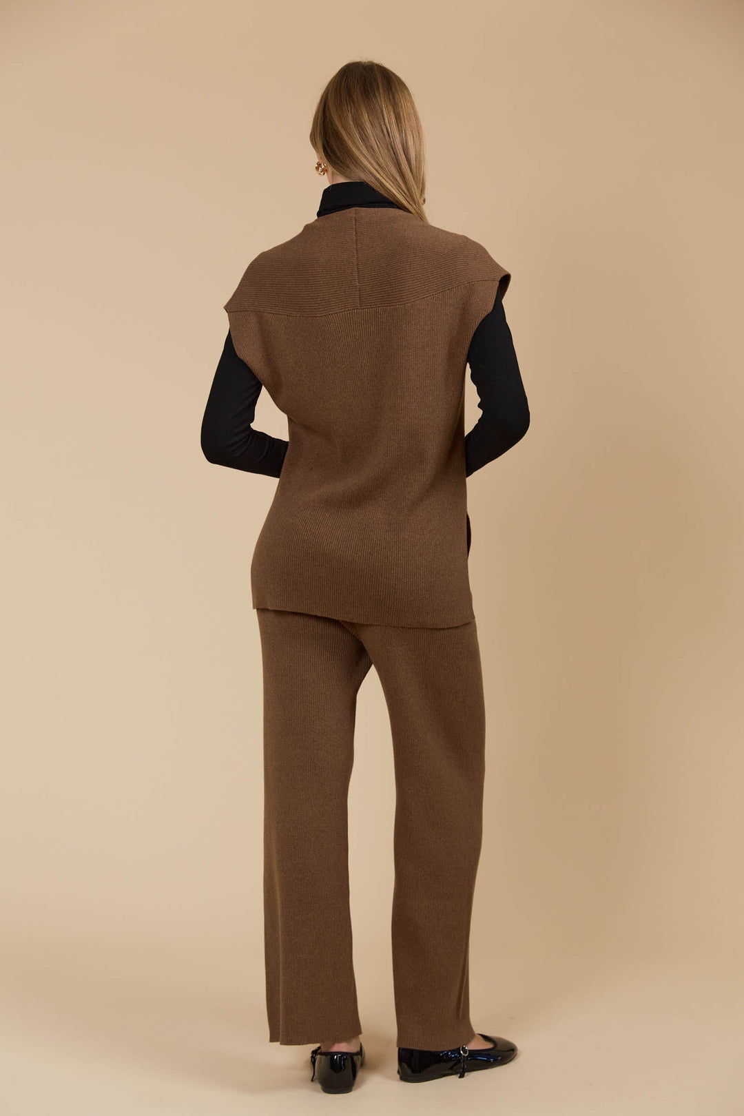 The Tala Knit Vest is designed to seamlessly take you from autumn through winter. Available from www.thecollectivenz.com
