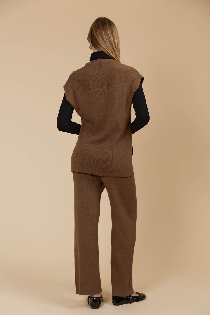 The Tala Knit Vest is designed to seamlessly take you from autumn through winter. Available from www.thecollectivenz.com