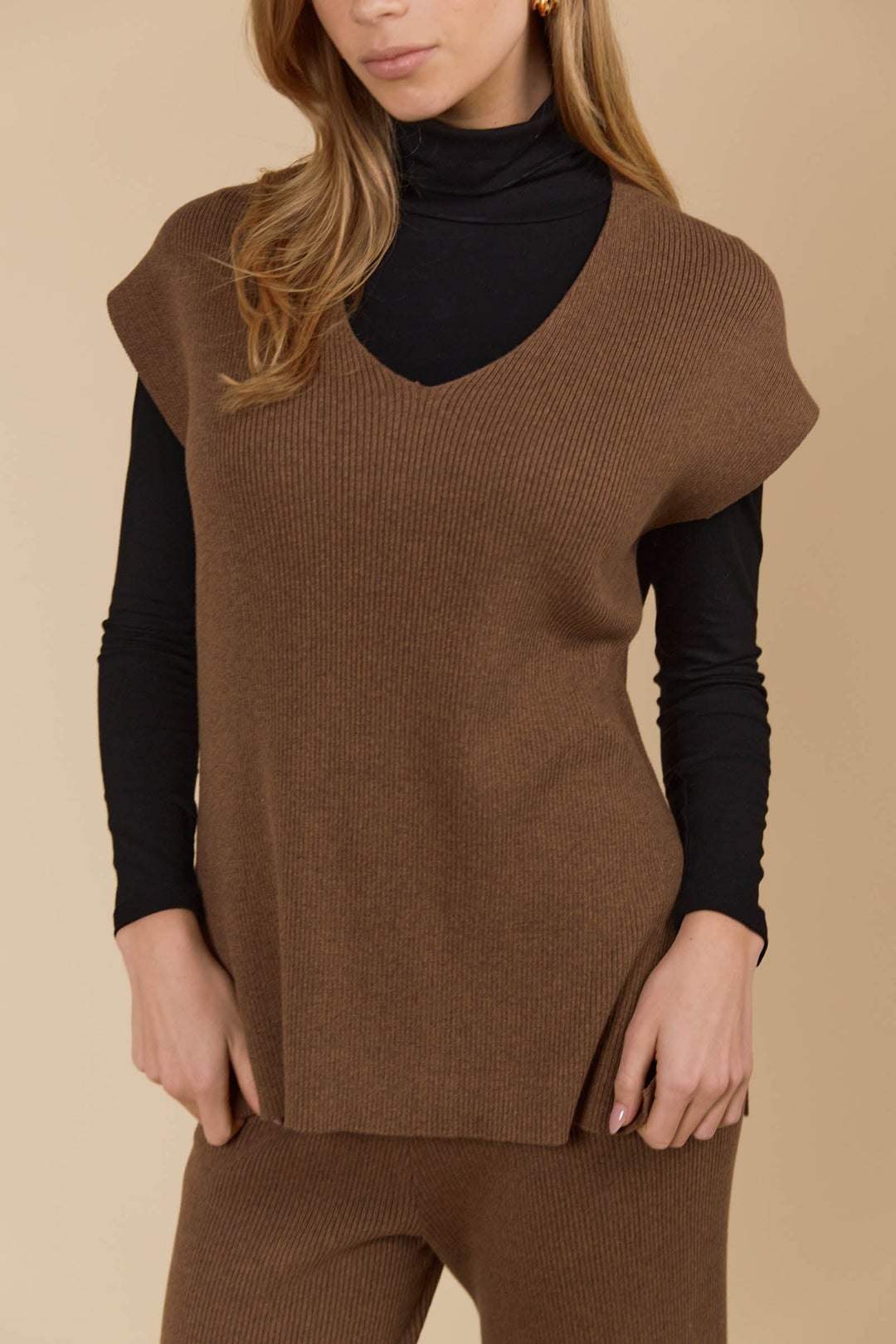 The Tala Knit Vest is designed to seamlessly take you from autumn through winter. Available from www.thecollectivenz.com