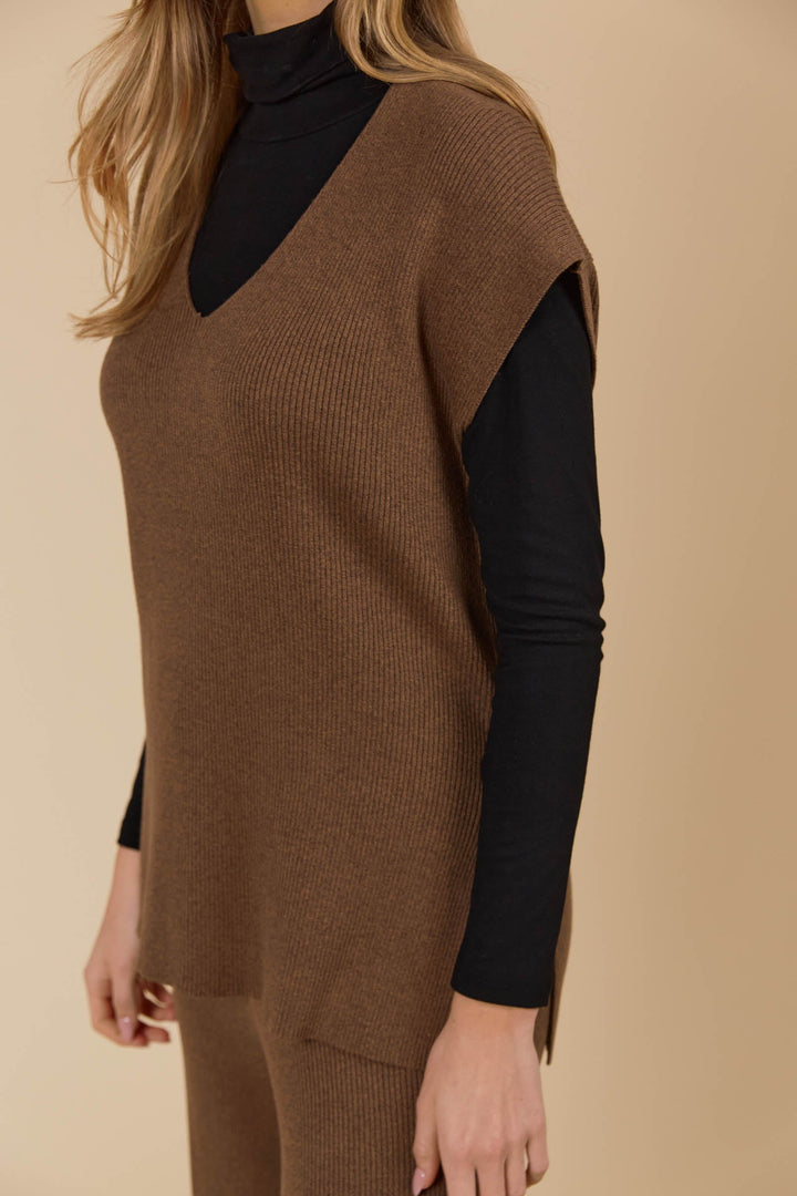 The Tala Knit Vest is designed to seamlessly take you from autumn through winter. Available from www.thecollectivenz.com