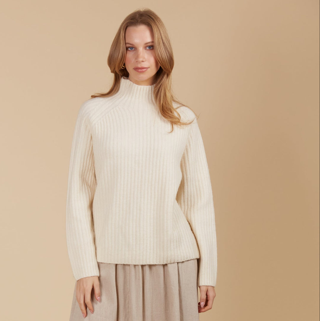 The Miru Jumper embodies cosy sophistication with its effortless silhouette and luxurious wool-recycled blend. Available from www.thecollectivenz.com