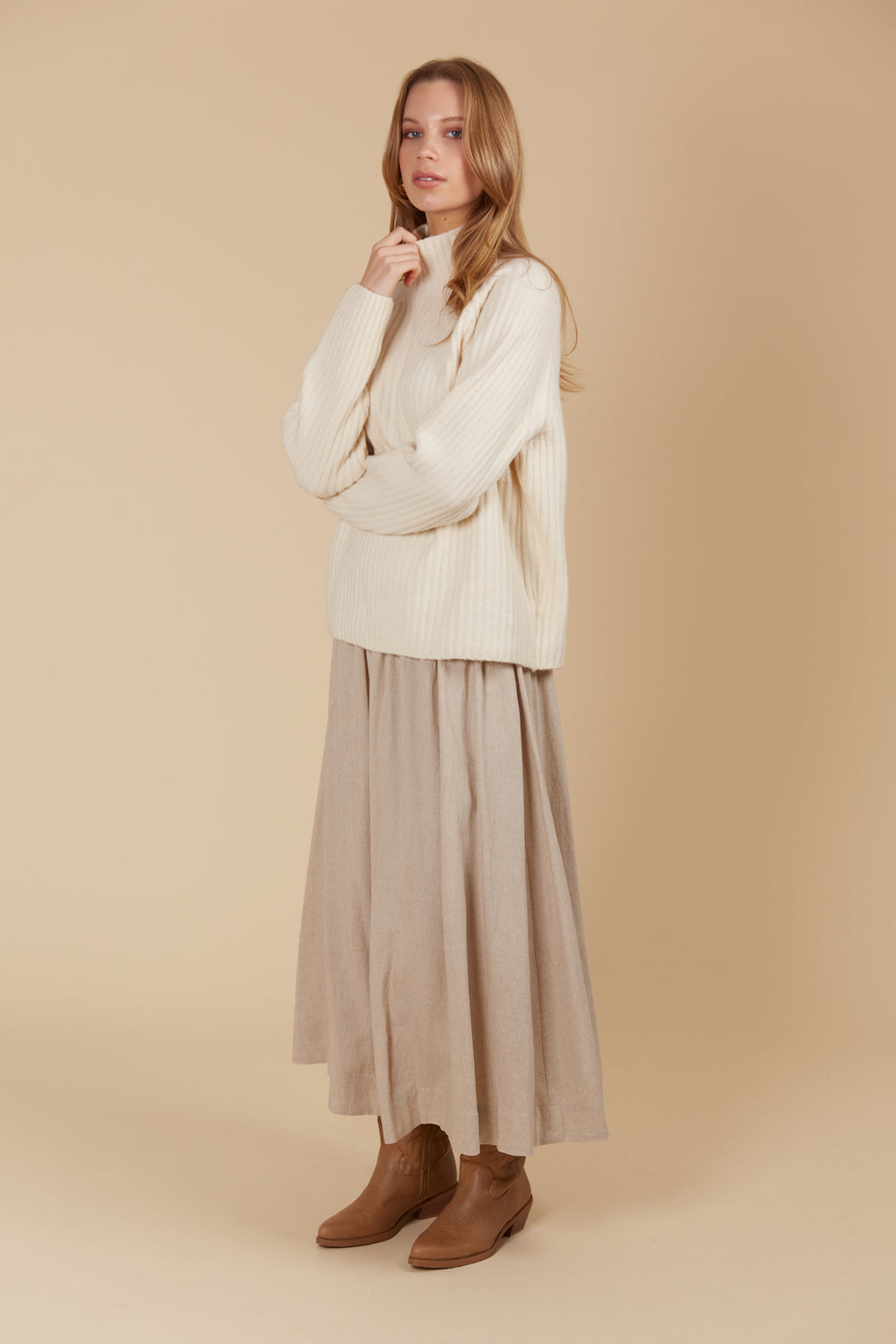 The Miru Jumper embodies cosy sophistication with its effortless silhouette and luxurious wool-recycled blend. Available from www.thecollectivenz.com