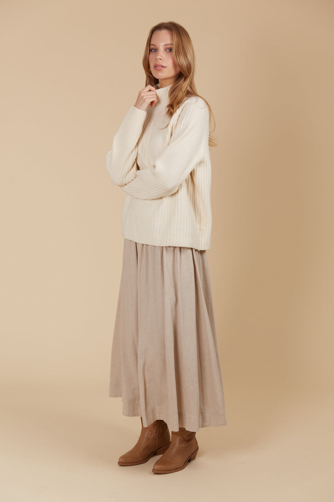 The Miru Jumper embodies cosy sophistication with its effortless silhouette and luxurious wool-recycled blend. Available from www.thecollectivenz.com