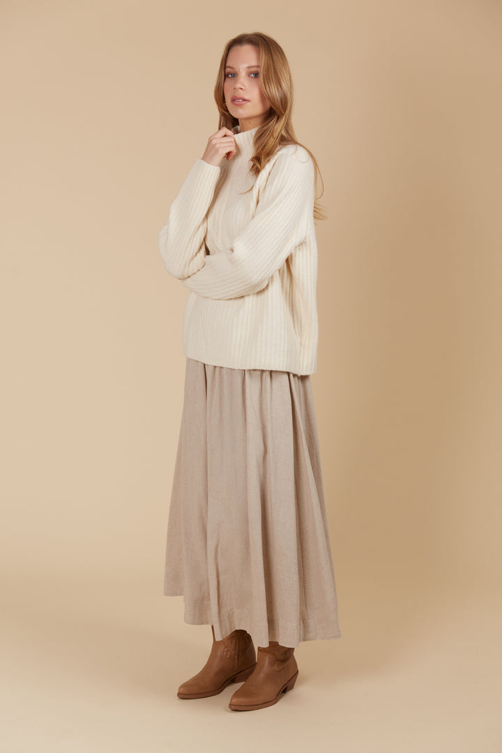 The Miru Jumper embodies cosy sophistication with its effortless silhouette and luxurious wool-recycled blend. Available from www.thecollectivenz.com