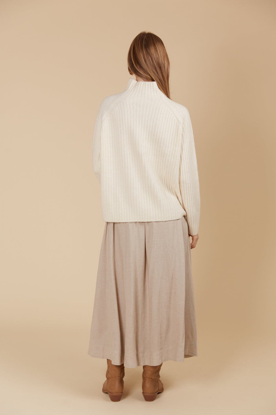 The Miru Jumper embodies cosy sophistication with its effortless silhouette and luxurious wool-recycled blend. Available from www.thecollectivenz.com