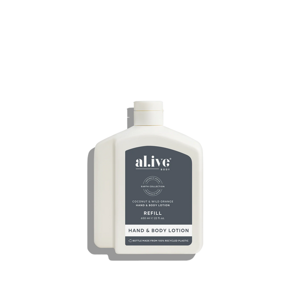 White bottle of al.ive hand and body lotion on a white background