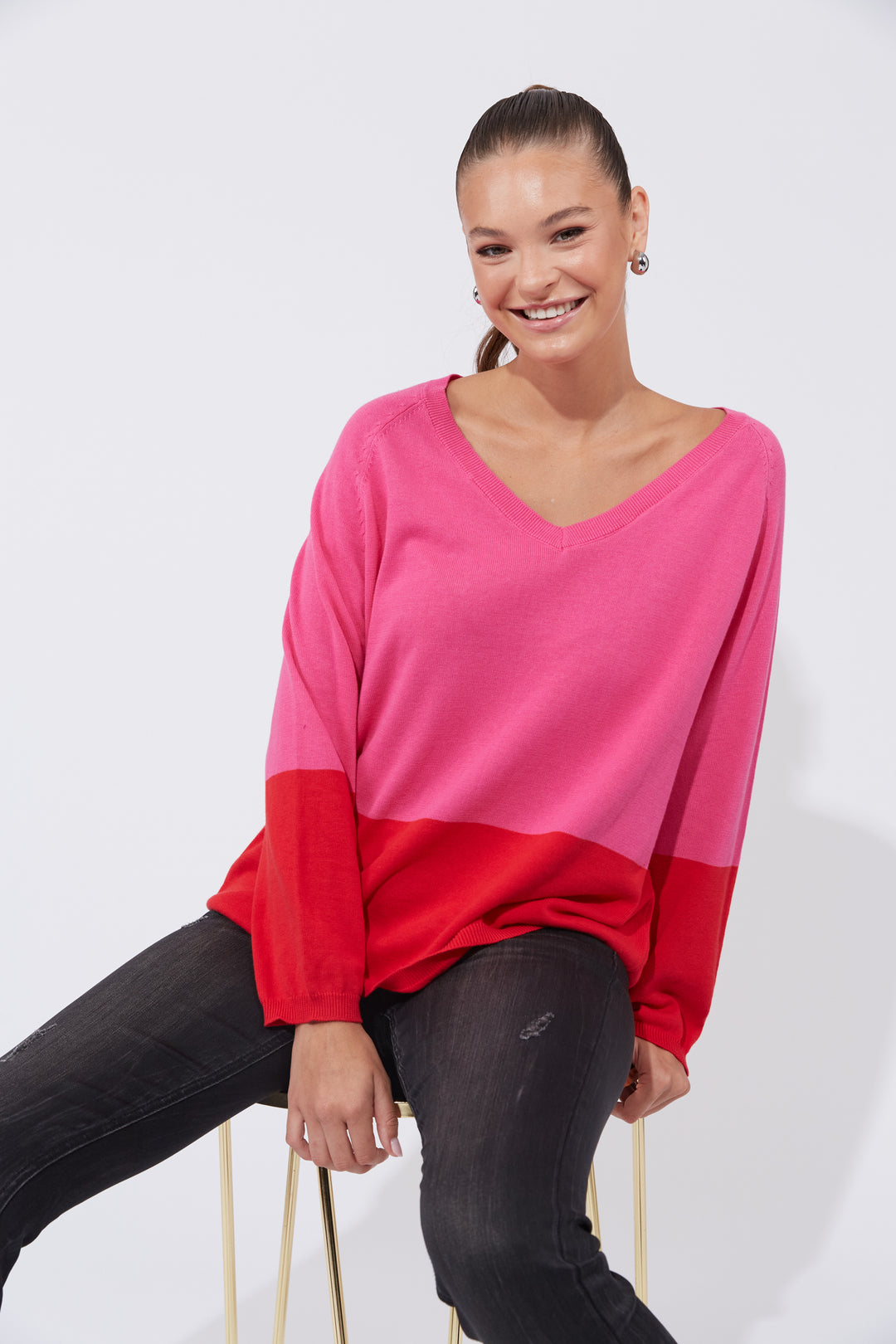 The Casablanca Block Knit combines simplicity with a touch of modern flair. This easygoing boxy sweater is designed with raglan sleeves and a V-neck for a relaxed fit. Available from www.thecollectivenz.com