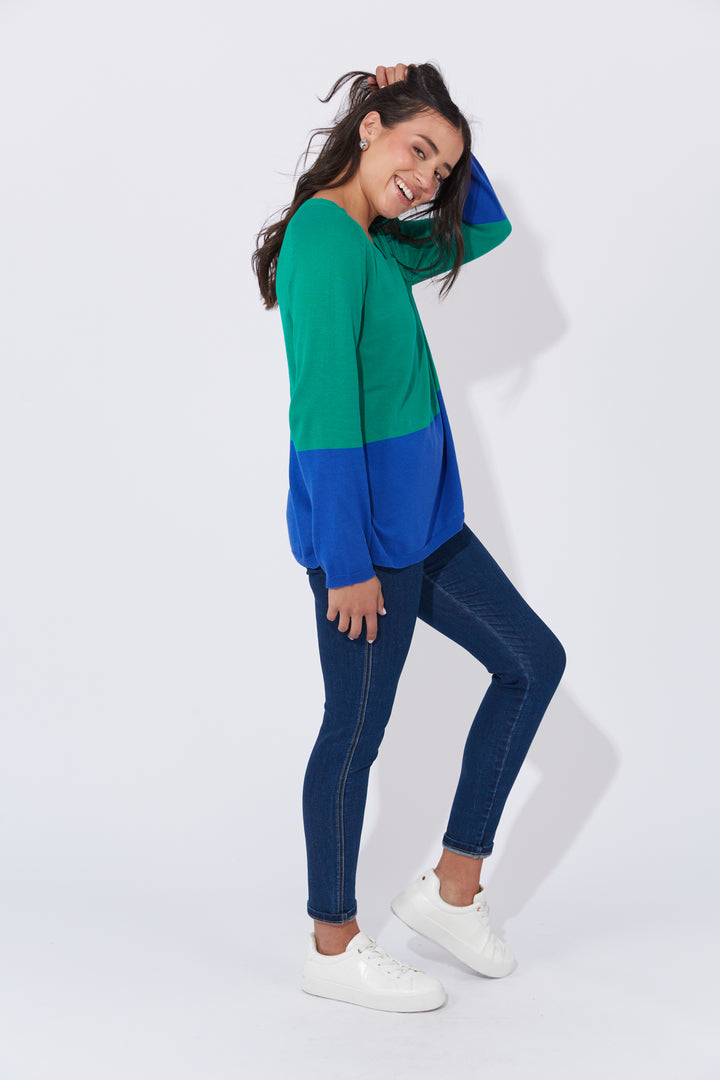 The Casablanca Block Knit combines simplicity with a touch of modern flair. This easygoing boxy sweater is designed with raglan sleeves and a V-neck for a relaxed fit. Available from www.thecollectivenz.com