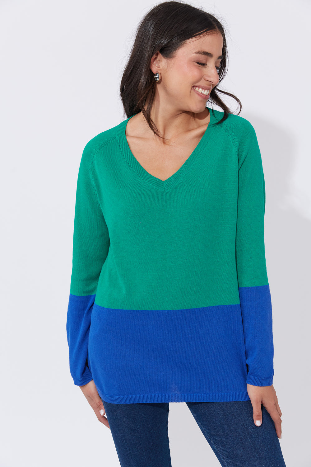 The Casablanca Block Knit combines simplicity with a touch of modern flair. This easygoing boxy sweater is designed with raglan sleeves and a V-neck for a relaxed fit. Available from www.thecollectivenz.com