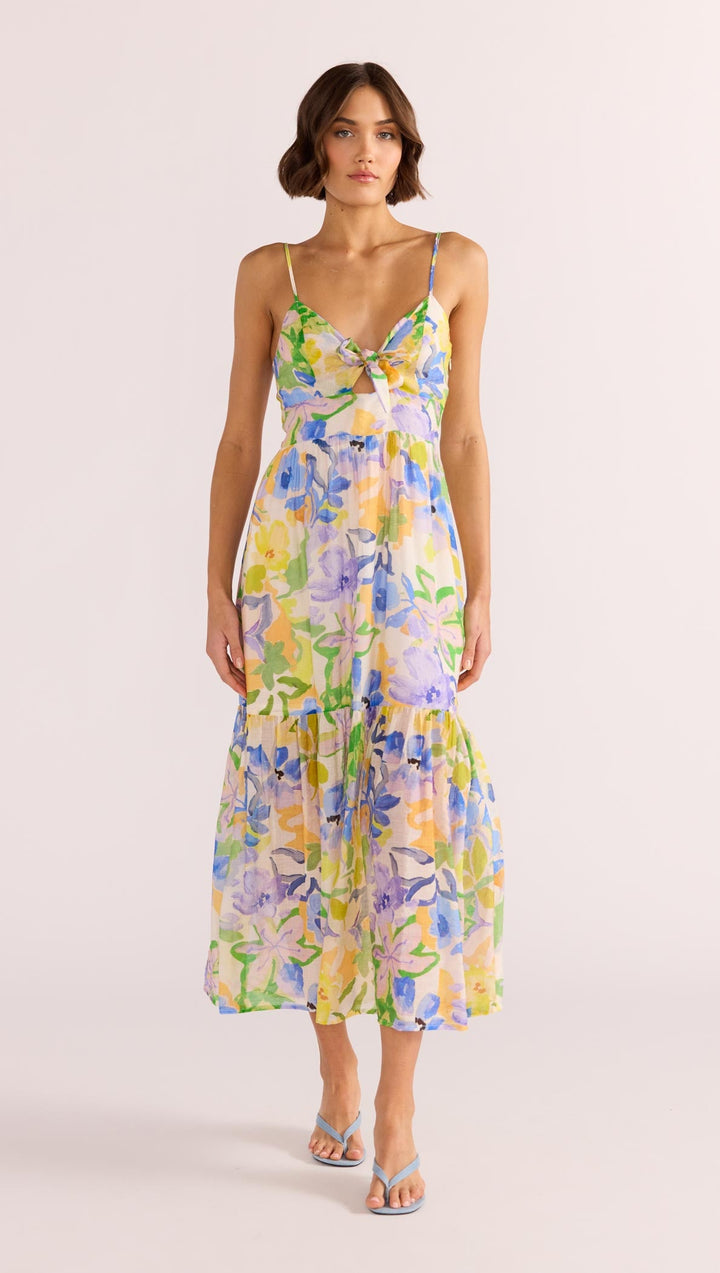 The Fable Tie Midi Dress encapsulates divine femininity. Featuring a bold floral pattern on a lightweight fabrication, available from www.thecollectivenz.com