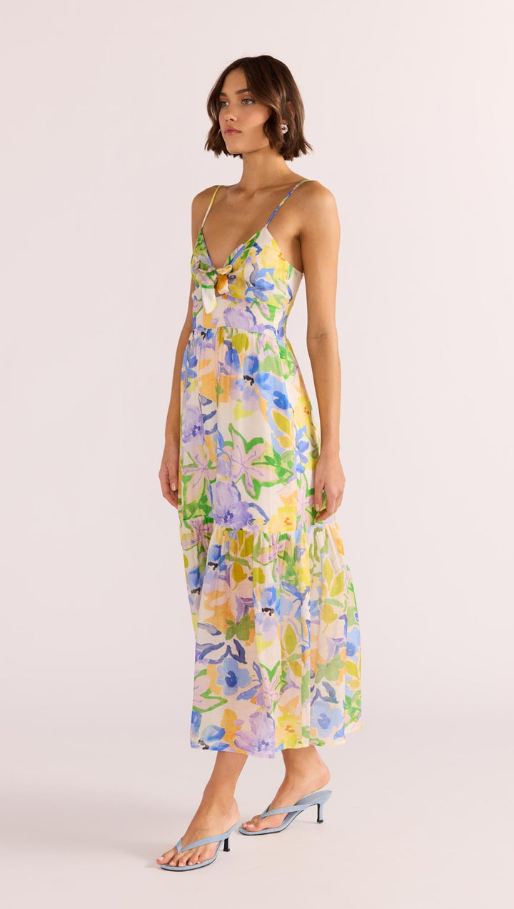 The Fable Tie Midi Dress encapsulates divine femininity. Featuring a bold floral pattern on a lightweight fabrication, available from www.thecollectivenz.com