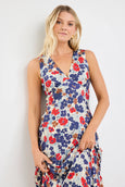 Woman wearing a floral dress against a white background