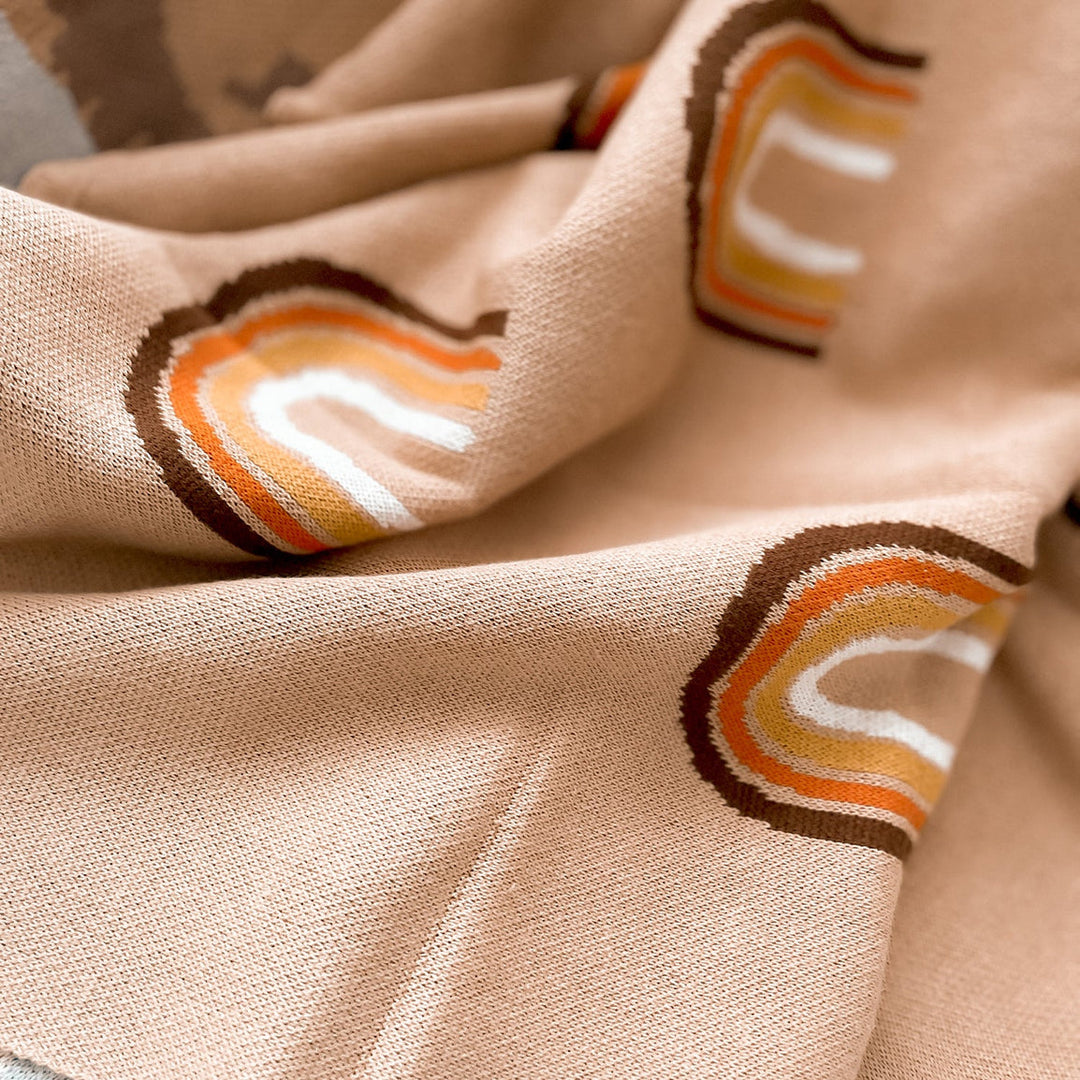 Fox & Fallow rainbow baby blanket available from www.thecollectivenz.com