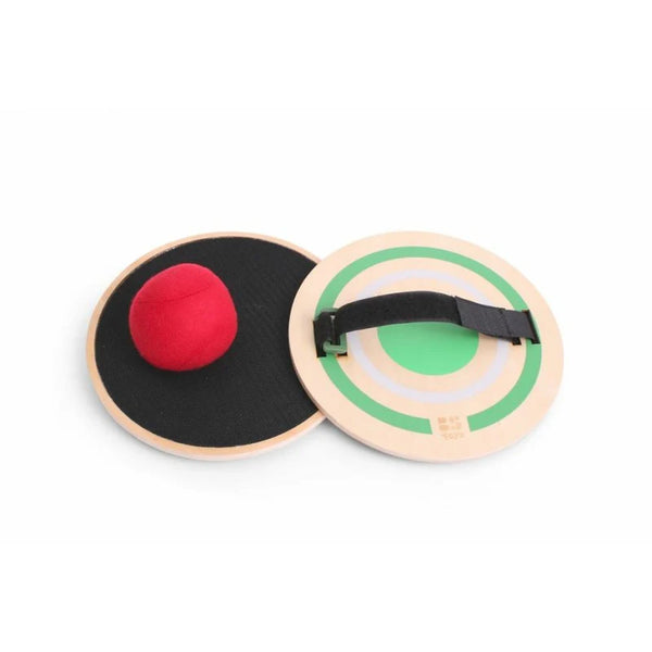 Two wooden discs with a red ball and a green target on a white background
