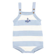 Bebe Light blue and white striped swimsuit with floral design on a white background
