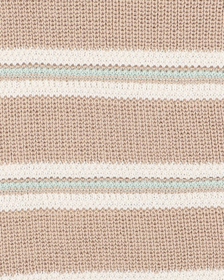 Close-up of a knitted fabric with horizontal stripes in beige, white, and light blue.