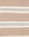 Close-up of a knitted fabric with horizontal stripes in beige, white, and light blue.