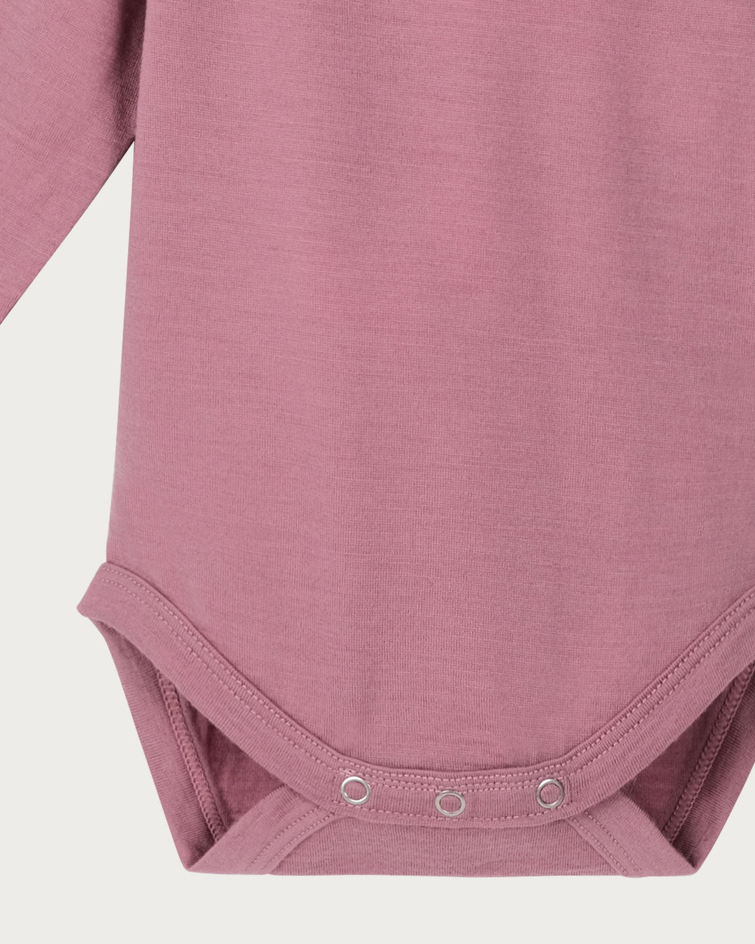 Babu Long-Sleeved Merino Bodysuit is an essential layette wardrobe staple available from www.thecollectivenz.com