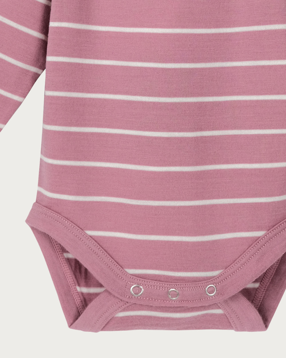 Babu Long-Sleeved Merino Bodysuit is an essential layette wardrobe staple available from www.thecollectivenz.com