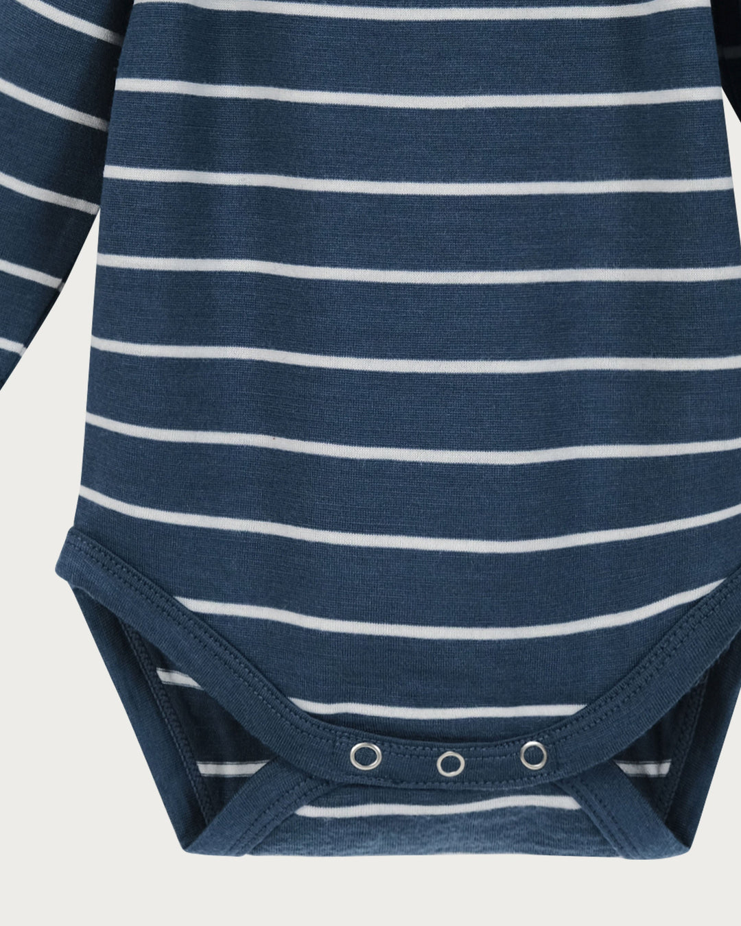 Babu Long-Sleeved Merino Bodysuit is an essential layette wardrobe staple available from www.thecollectivenz.com