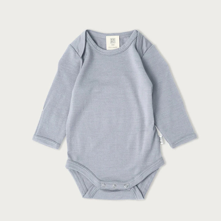 Babu Long-Sleeved Merino Bodysuit is an essential layette wardrobe staple available from www.thecollectivenz.com