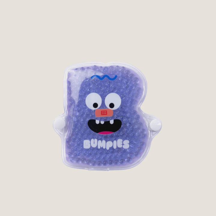 Purple gel pack with cartoon face design on a white background