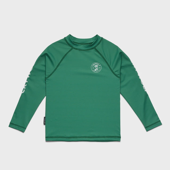 A green long-sleeve rash guard with raglan sleeves, a mock neck, and a circular logo on the left chest, displayed flat against a light gray background.