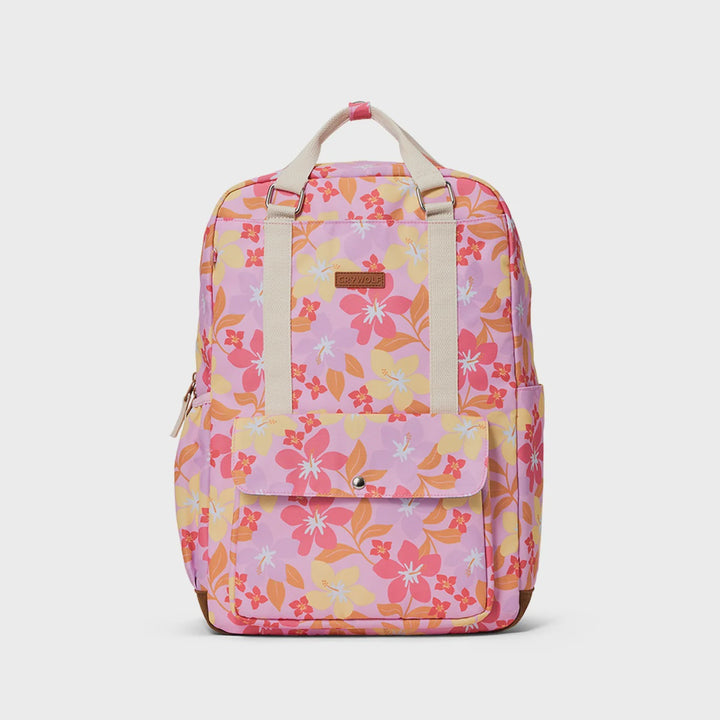 A pink floral backpack with a light pink base, decorated with pink, orange, and yellow hibiscus flowers. It features cream-colored top handles, a front flap pocket, and side pockets, shown against a light gray background.