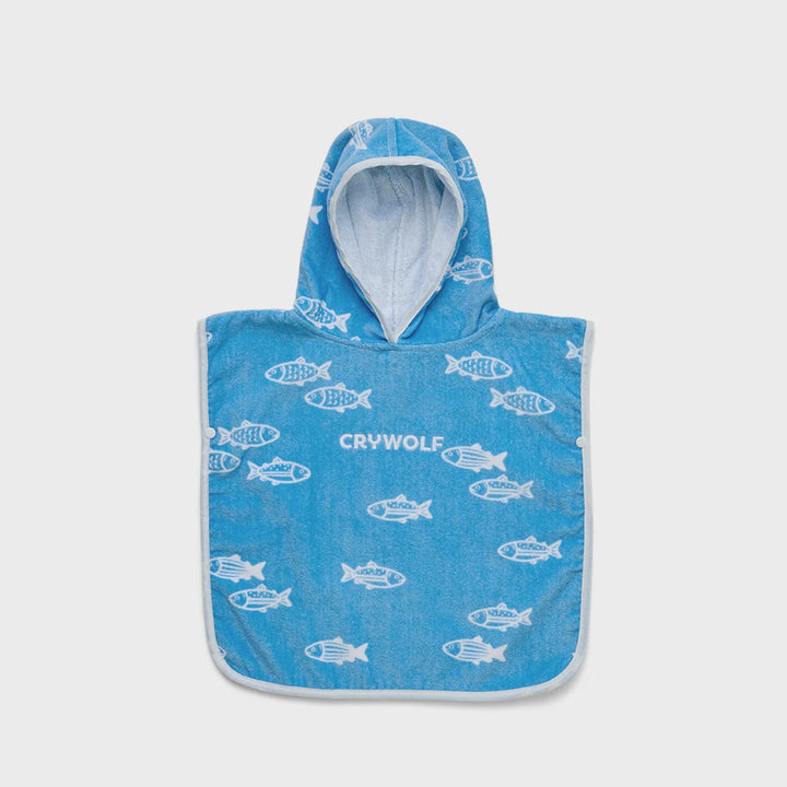 A blue hooded towel or poncho with a white fish pattern and the brand name 'CRYWOLF' printed on the front, shown against a plain white background.