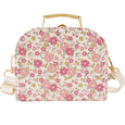 A fashionable cross body mini case in a sweet little floral print. The cutest size and adjustable strap. A cute perfect first bag for your little ones accessories collection. Available from www.thecollectivenz.com