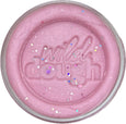 Pink dough in a container with 'willah dough' branding on a white background